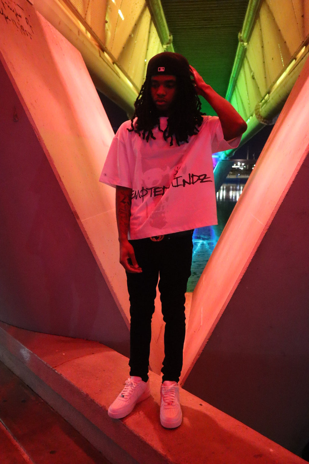 Tempted Mindz streetwear graphic tee on model